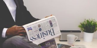 The hand rail is going a little faster than the moving sidewalk.