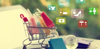 How Odoo Makes Retail and Online Shopping Easier for Businesses Retail shop owner managing both online and in-store orders using Odoo’s all-in-one business dashboard on a tablet.