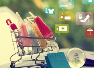 How Odoo Makes Retail and Online Shopping Easier for Businesses Retail shop owner managing both online and in-store orders using Odoo’s all-in-one business dashboard on a tablet.