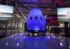 What’s Going On with SpaceX’s Dragon Spacecraft and Elon Musk’s New Plans? “SpaceX Dragon spacecraft floating in orbit above Earth with stars and space in the background.”