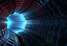 How Fast Is Quantum Tunneling? Scientists Just Found Out — And It’s Mind-Blowing A glowing electron zipping through a barrier, representing the speed of quantum tunneling