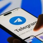 When Privacy Gets Dangerous: How Telegram Became a Tool for Crime A smartphone screen showing the Telegram logo with a shadowy figure in the background, symbolizing online misuse and crime