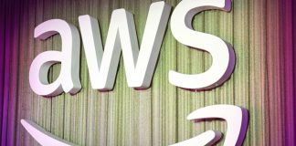 AWS and Anthropic Are Launching an AI Agent Marketplace—Here’s What That Means for Everyone A simple, clean digital illustration of a virtual robot assistant helping a businessperson at a laptop, symbolizing AWS AI agent support in daily tasks.