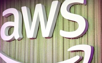 AWS and Anthropic Are Launching an AI Agent Marketplace—Here’s What That Means for Everyone A simple, clean digital illustration of a virtual robot assistant helping a businessperson at a laptop, symbolizing AWS AI agent support in daily tasks.