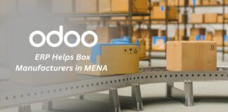 Smart Packaging, Smarter Systems: How Odoo ERP Helps Box Manufacturers in MENA "Factory worker managing packaging production using Odoo ERP dashboard – tracking BOM, stock, and RFQ."
