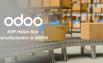 Smart Packaging, Smarter Systems: How Odoo ERP Helps Box Manufacturers in MENA "Factory worker managing packaging production using Odoo ERP dashboard – tracking BOM, stock, and RFQ."