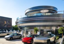Tesla’s Retro Diner is Here – Where the Future Meets the 1950s! Tesla’s retro-futuristic diner in Los Angeles with EV Superchargers, neon lights, and roller-skating servers serving food