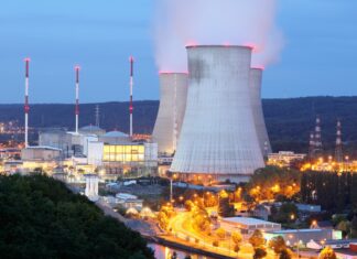 Nuclear-Powered AI? Big Tech Wants It Here’s the Full Story "A glowing AI brain connected to a nuclear reactor symbol, representing the future of artificial intelligence powered by atomic energy."